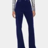 Baggy pants in velvet with 1969 discs