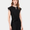 Black draped dress with signature piercing