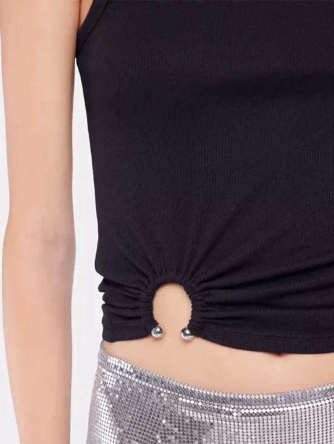 Black tank top with signature piercing