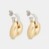 Eight chunky earrings in silver and gold