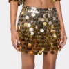 Gold mini skirt in gradient assembly