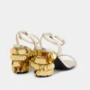 Gold sandals with Sparkle disc heels