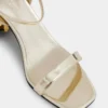 Gold sandals with Sparkle disc heels