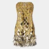 Gold short dress in assembly