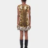Gold short dress in assembly