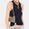 Black tank top with signature piercing