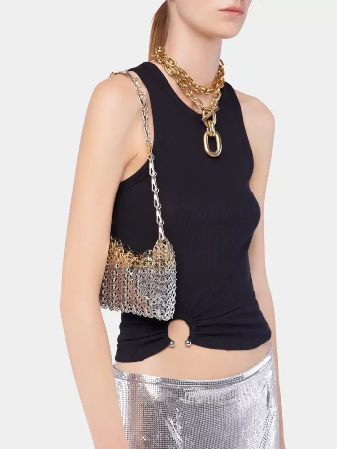 Black tank top with signature piercing