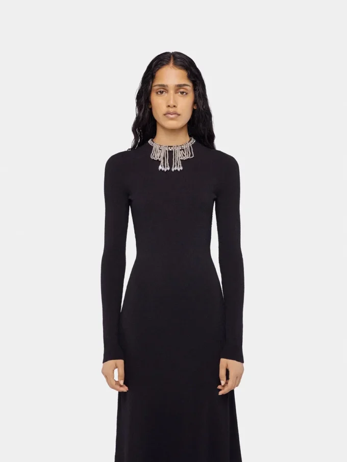 Long backless knit dress with embroideries