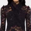 Long-sleeved lace top with cut-out details