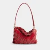 Red Paco shoulder clutch in calfskin leather