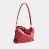 Red Paco shoulder clutch in calfskin leather