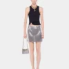 Black tank top with signature piercing