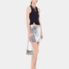 Black tank top with signature piercing