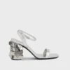 Silver sandals with Sparkle disc heels