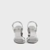 Silver sandals with Sparkle disc heels