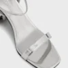 Silver sandals with Sparkle disc heels