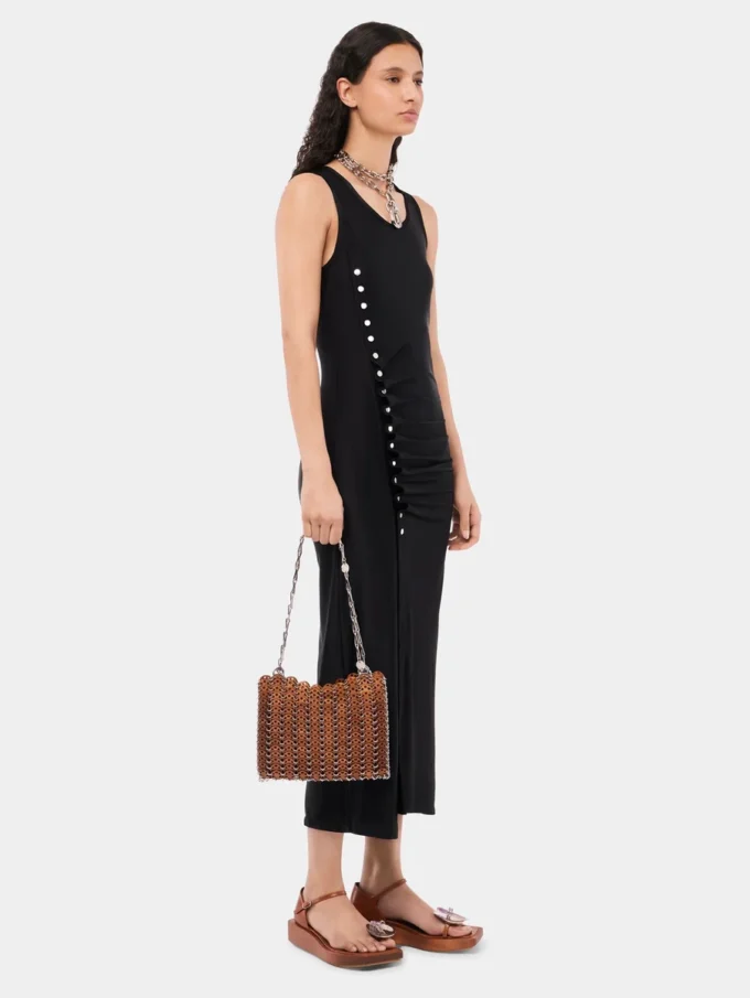 Sleeveless black drappé pression dress