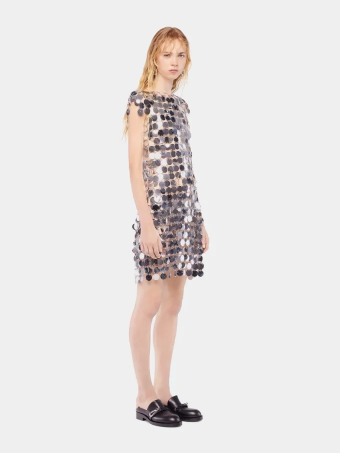 The iconic silver Sparkle disc dress