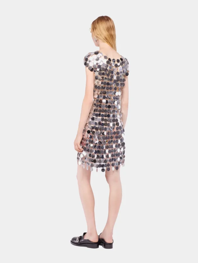 The iconic silver Sparkle disc dress