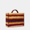 Tote bag in raffia with straps