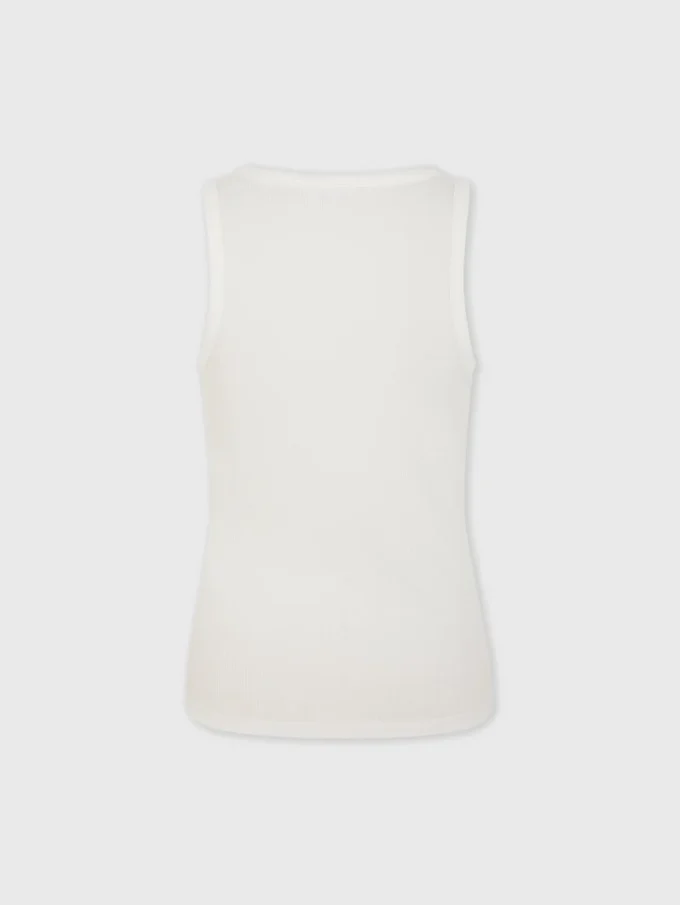 White tank top with signature piercing